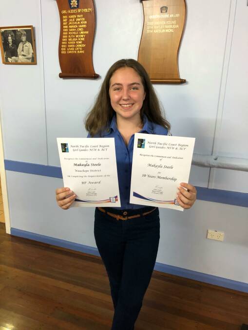 Great work: Makayla Steele earns her Baden Powell Award and 10 years' service to Girl Guides.
