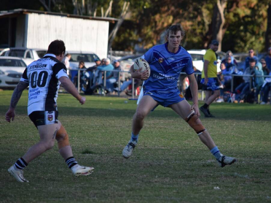 The step: Kendall's Brad Smith crossed for two tries in the Blues' win over the Lower Macleay Magpies at Smithtown on Saturday. Photo: Deena Hanlon