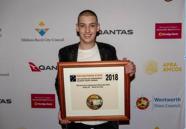 Star on the rise: Wauchope's Angus Gill  with the coveted Male Rising Star award for his single Hands are Clean at the annual Southern Stars Australian Independent Country Music Awards.