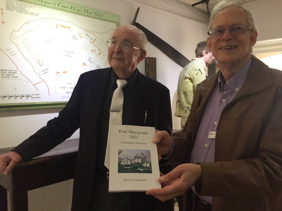 Book launch: Author Richard Grimmond and Port Macquarie Historical Society president Clive Smith launching Mr Grimmond's latest book.