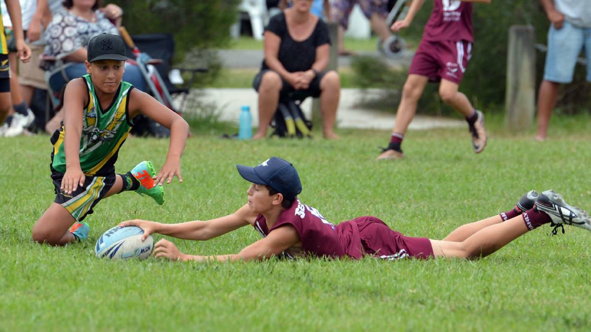 Lock it in: Port Macquarie-Hastings Council and the St Agnes Parish work together to secure future of Tuffins Lane sporting fields.