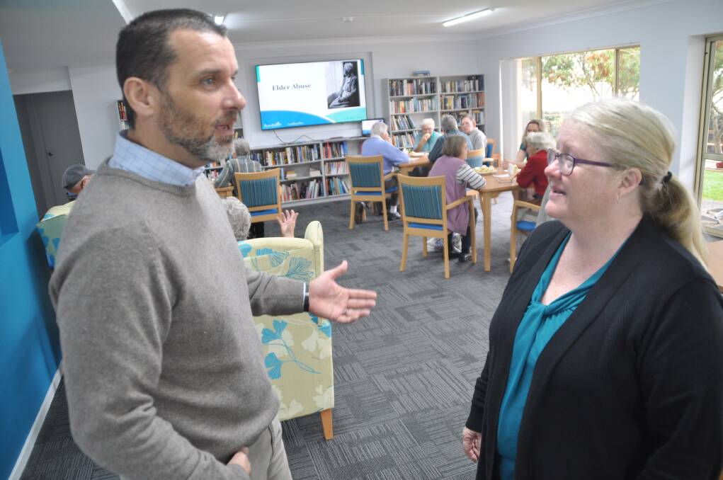 Awareness campaign: Bundaleer CEO Gareth Norman and manager of care services Louise Roberts helping residents and friends better understand what constitutes elder abuse during a seminar on Thursday.