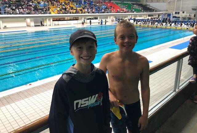 SOAKING UP THE ATMOSPHERE: Flynn Daley and Axl Pope in Sydney.