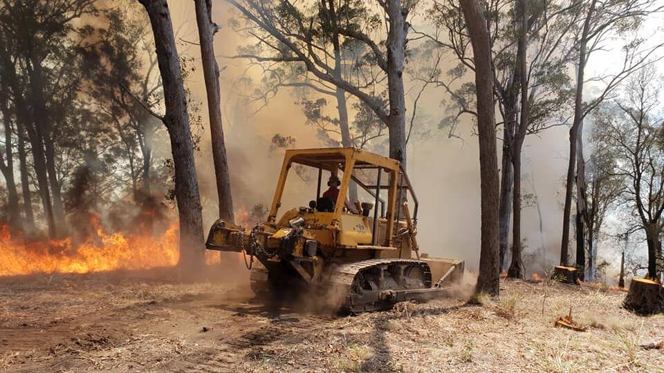 Working to contain fires. Photo courtesy of Beechwood Rural Fire Brigade.