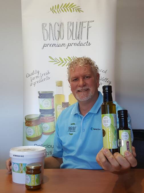 WINNERS ARE GRINNERS: Bago Bluff manager Tim Walker with the four medal-winning condiments.
