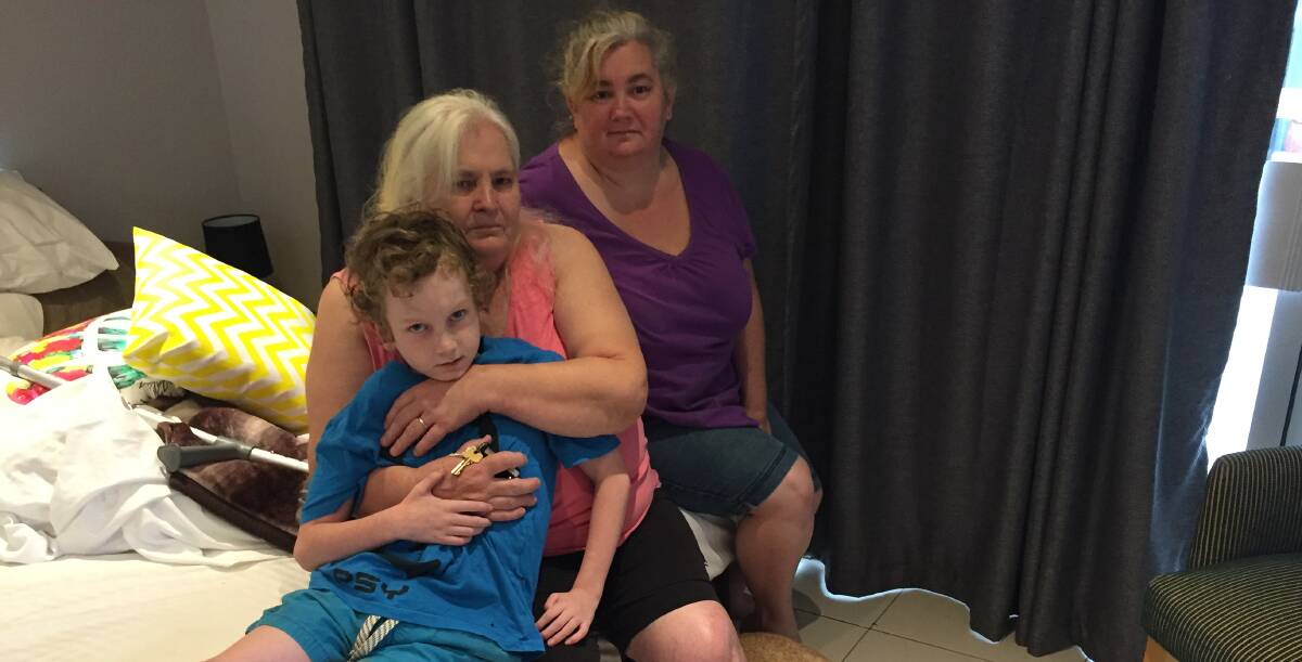 SHELTER: Pappinbarra resident Barbara Roelandts, her daughter, Donna Adams and grandson fled intense heat and spent the night at Timbertown Motel.