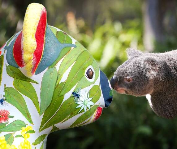 A koala checks out one of the sculptures. The one at Ellenborough has made it to the finals of the NSW Tourism Awards. Photo: Hello Koalas Sculpture Trail.