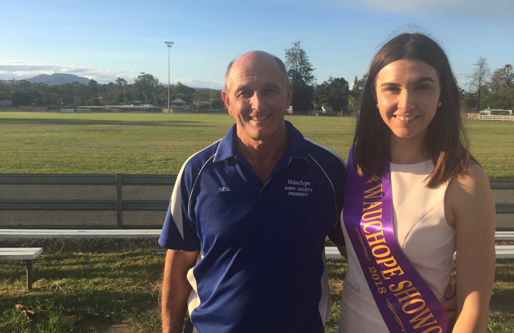 EXCITEMENT IS BUILDING: Wauchope Show Society president Neil Coombes and this year's Showgirl, Madeline Dobson at the Showground.