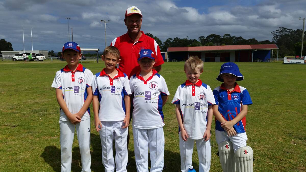 READY FOR ACTION: Coach Brian Fowler with his U10s from Wauchope RSL Cricket Club, gearing up for the upcoming season.