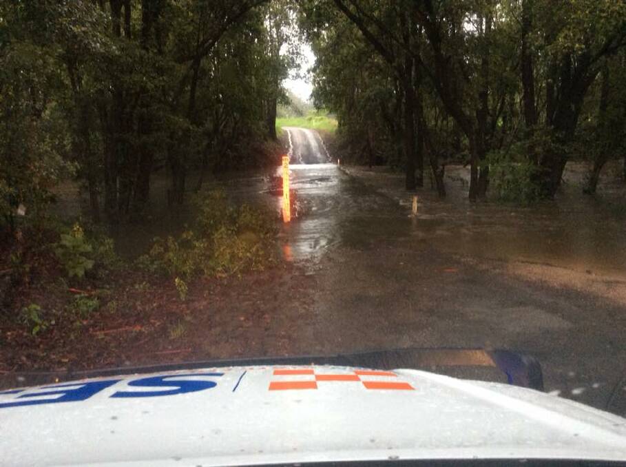 Bridge at Mortons Creek Road near Beechwood is underwater. Photos: NSW SES Wauchope.