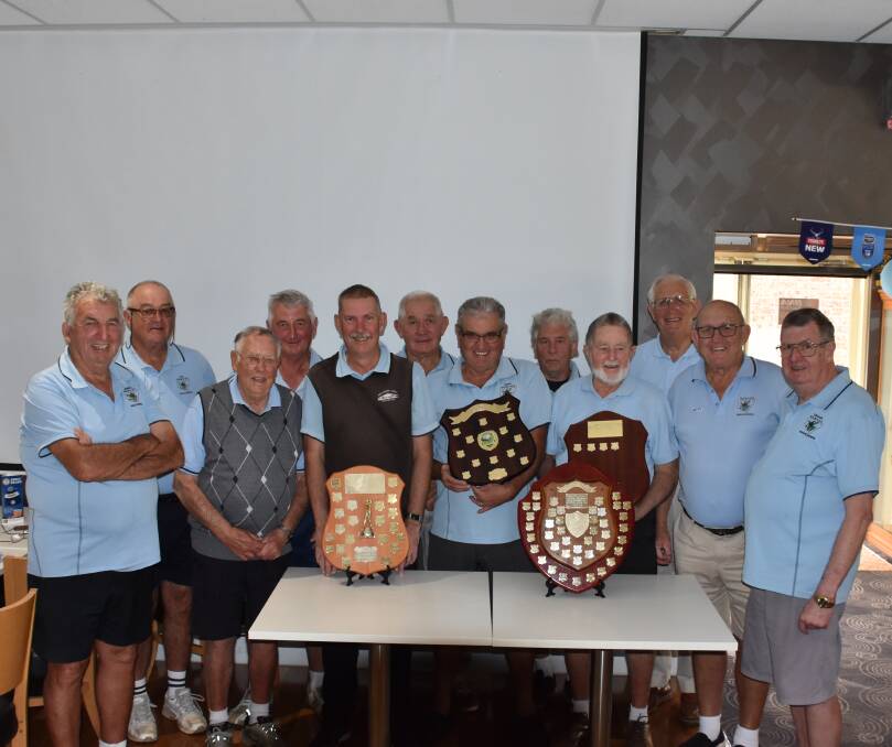 CLEANING UP: Wauchope Men's Veteran Golf Club celebrate winning all the shields they played for this year.