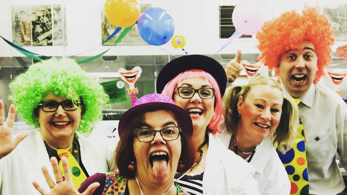 MAKE 'EM LAUGH: Staff at Wauchope CBA Karen Stig, Robyn Cooper, Jayne Farrell, Lauren Pye and Marc Schneider raised $370 for the Clown Doctors charity.