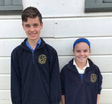 YOUNG CHAMPIONS: Tom Baker and Grace Smith from St Joseph's Primary in Wauchope are through to the NSW state championships.
