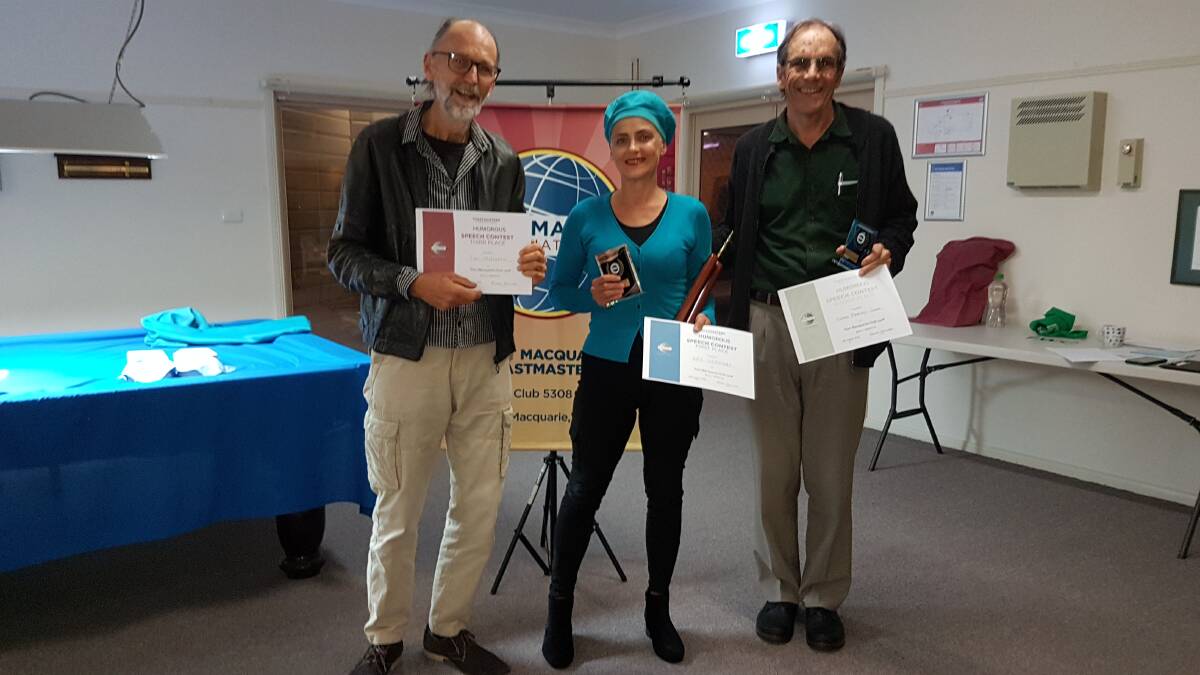 Award-winning toastmasters Tom McIlveen, Kay Simmons and Simon Mervyn Jones at a competition last year. 