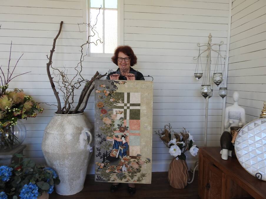 Artist Wendy Duffy with some of her work.