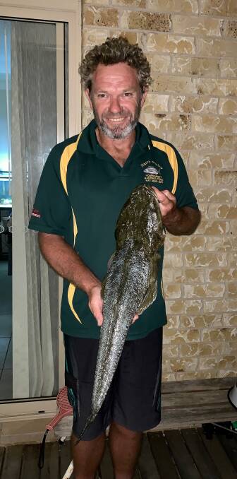 PROUD OF HIS CATCH: Dan Murphy of Wauchope RSL Fishing Club with his 2.2kg flathead.