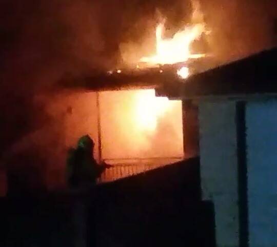 Fire at a house in Bain Street.  Photo courtesy of Emily Kucera.