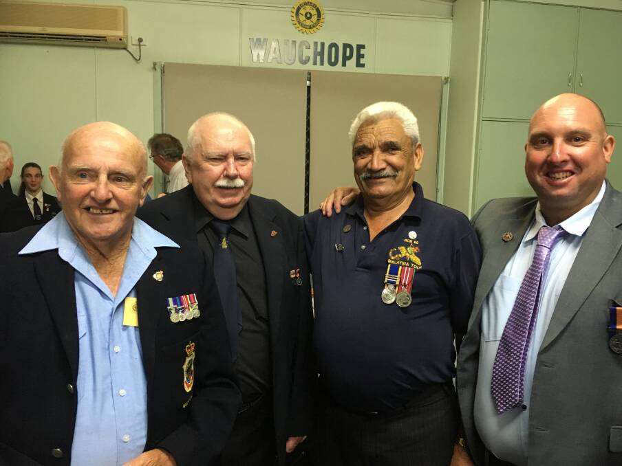 ROTARY ANZAC DINNER: Ted Scott, Ken Meredith, Billy Slater and Daniel Caraghin at the special night. Photo: courtesy of Robyn Flanagan.