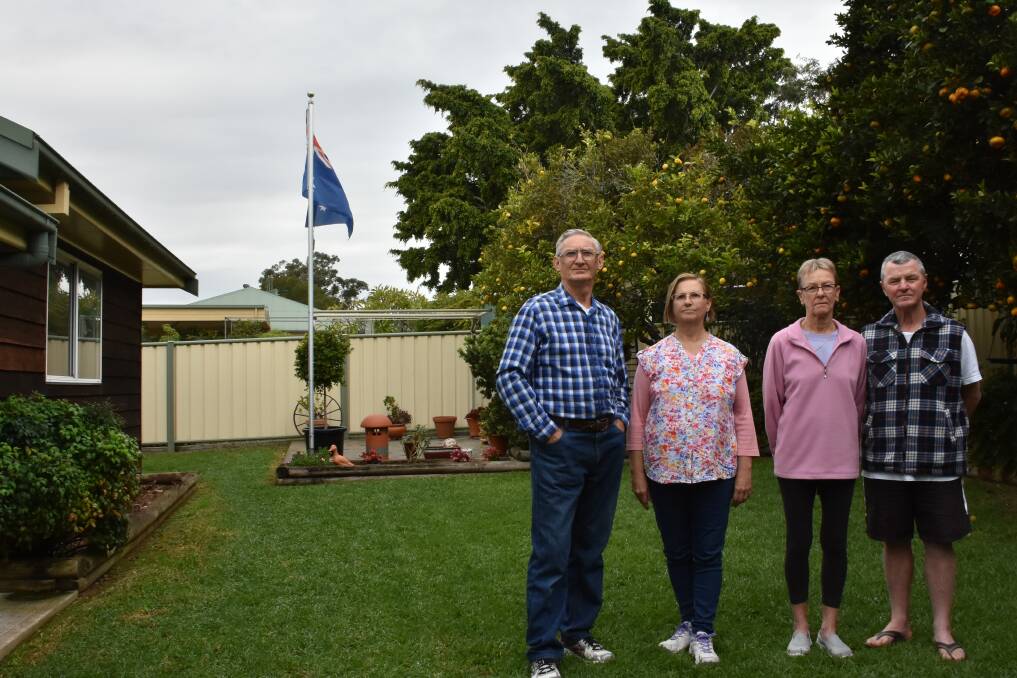 WORRIED RESIDENTS: Alan and Sandra Petts and Pixie and John Hammond say the planned four-storey Bundaleer nursing home would be the height of the tree behind them.