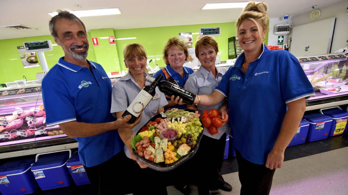Get ready for tasty treats: Andrew Willows, Mellissa Ward, Lisa Attkins, Carol Lowe and Kylie Joseph prepare for the Hastings Co-op Twilight Tastings this Friday night at Wauchope Showground.