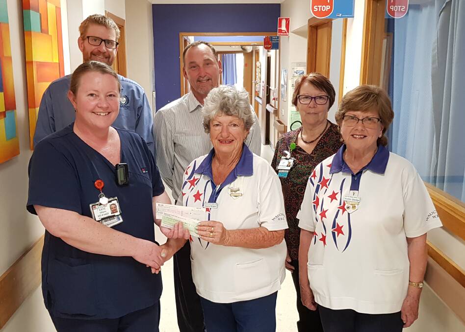 HELPING OUT: (back) Caleb Rose, Wauchope Country Club, Danny Passfield and Judy Beilby from Wauchope Hospital, Nursing Unit manager Kate Williams, with bowlers Marie Winter and Heather Eldridge.