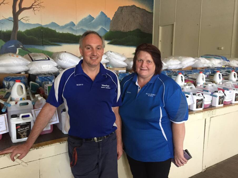 KINDHEARTED: Scott Balmer and Heather Lattimore from Wauchope Show Society with some of the hampers for fire victims.