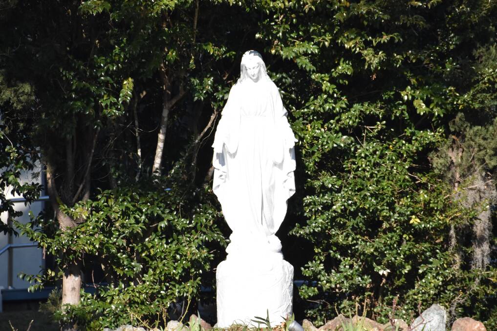 The statue of Our Lady of Lourdes is back in the grotto of the Catholic church in Wauchope.
