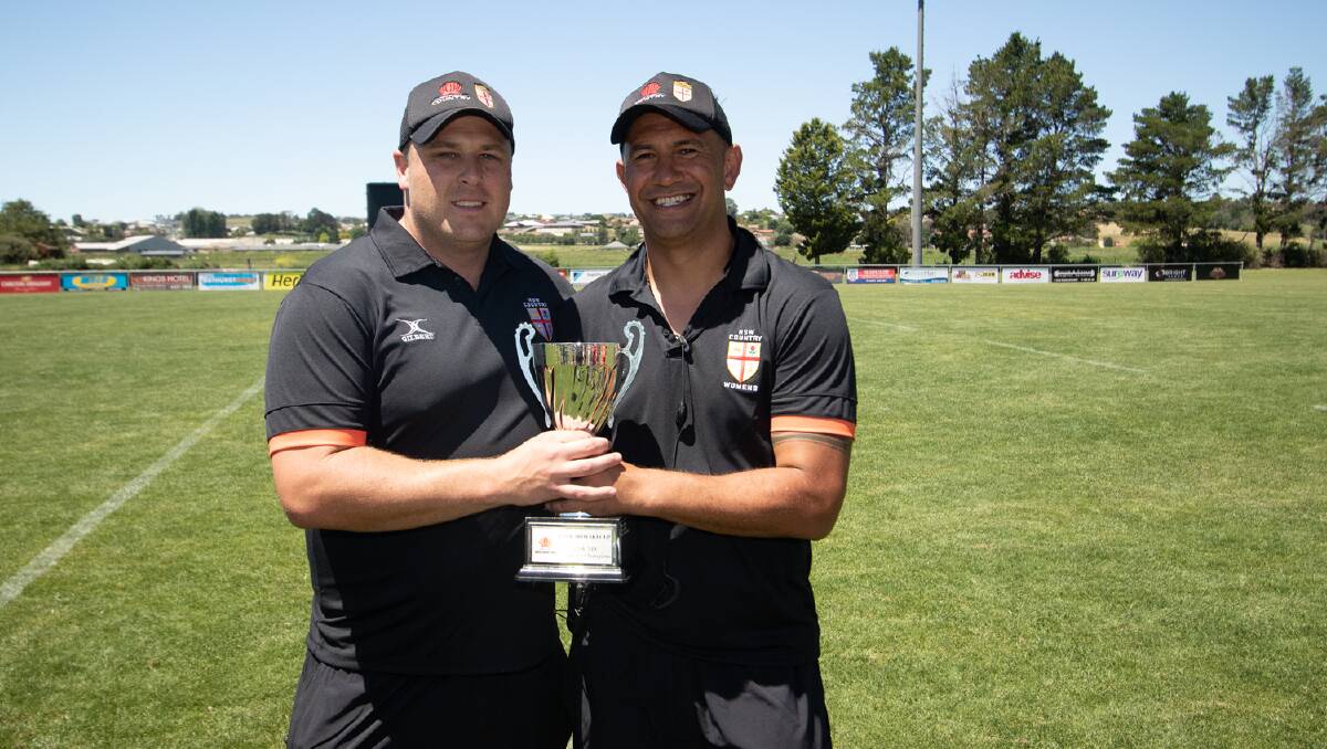 Winners: NSW Country women's coach Paddy Bowen and Shaun McCreedy with the Chikarovski Cup. Photo: Josh Brightman/Balanced Image Studio
