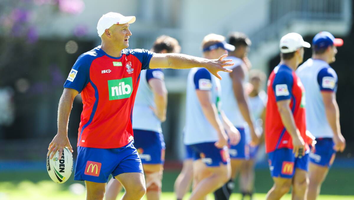 Work in progress: Knights coach Nathan Brown barks orders during a Newcastle training session. Photo: Jonathan Carroll