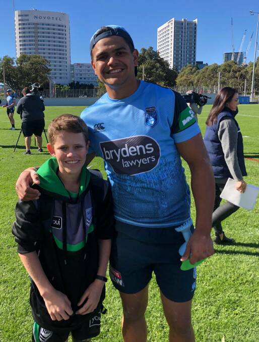 Jesse Fisher with Latrell Mitchell. Photo: supplied