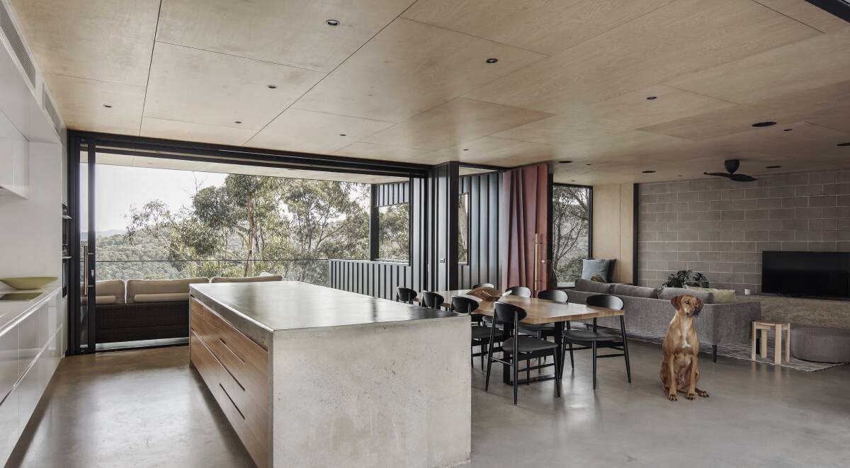 MIXED MATERIALS: The use of timbers, neutral tones and natural finishes enhance the bush landscape surrounding the house and enhance the relaxing beach house vibe. Photos: Ben Hosking. 