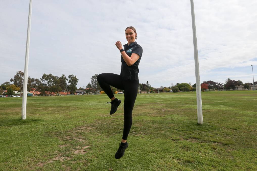 GIANT LEAP: Jacqui Coughlan is using social media to help
people stay fit and active during the COVID-19 pandemic.
Pictures: TARA TREWHELLA
