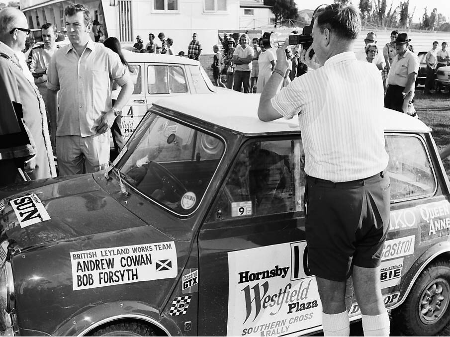 Excitement: Mayor Adams chats to Scottish rally driver, Andrew Cowan, during the 1970 Southern Cross Rally stopover in Port Macquarie.