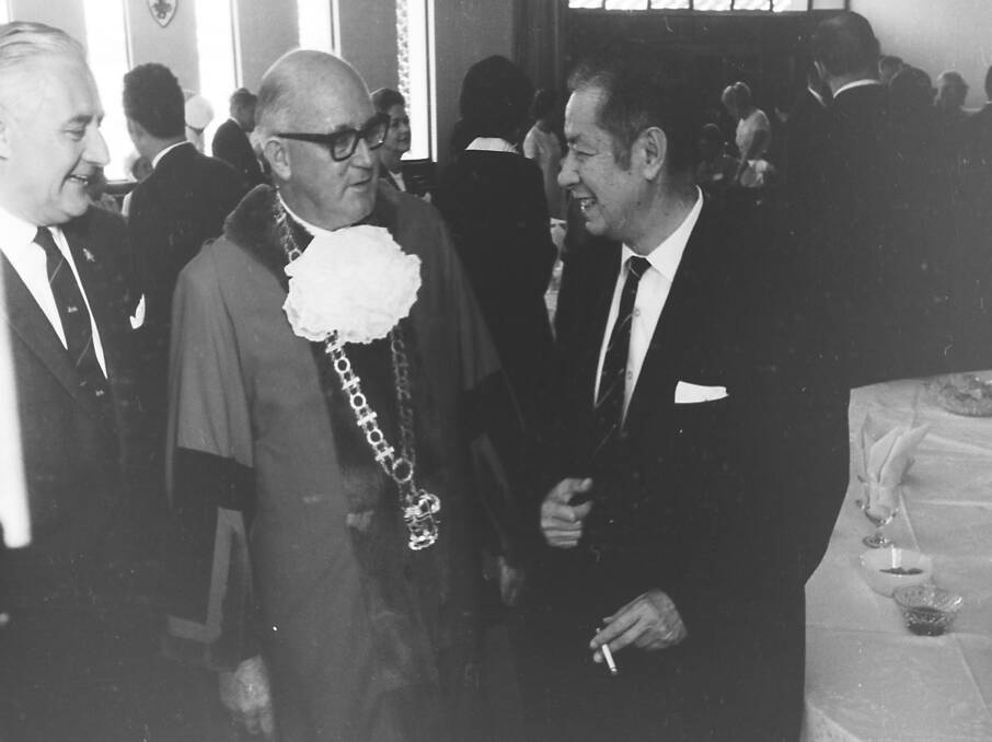 Formal occasion: Phil Lucock, Ald C.C. Adams and Mariano Expeleta, ambassador for the Philippines at the Lions Convention, 1969.