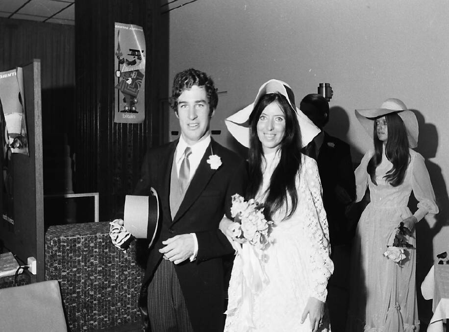 Mr & Mrs Ken Messenger enter their wedding reception, 1970.
