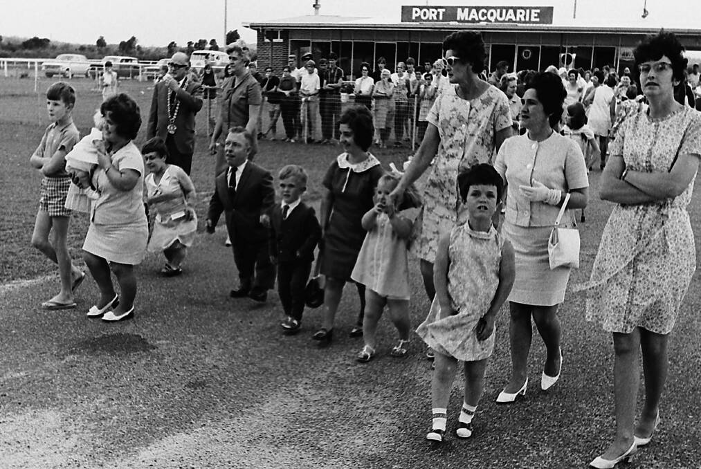 Welcome: Conventioneers arriving at Port Macquarie airport, with Rosemary Whittaker and daughter Lynette at left, 1968. Photos: Port Macquarie Musuem