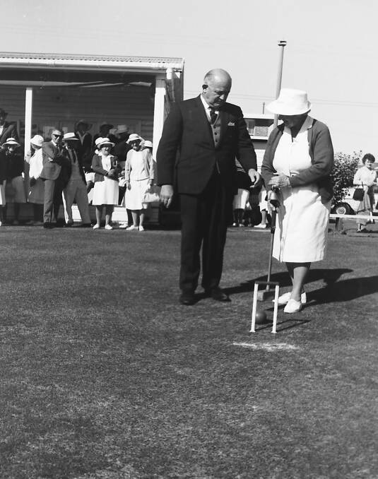 Excellent attendance: Mayor Adams with club president Mrs C. Lewis on the green at the croquet tournament's official opening.