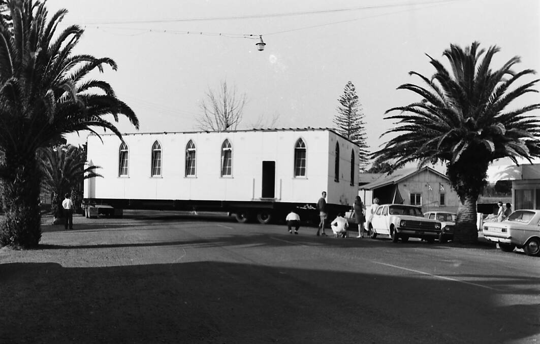Tricky operation: The Seventh Day Adventist Church being moved to its new Savoy Street location, 1970. Photo: supplied by Port Macquarie Museum.