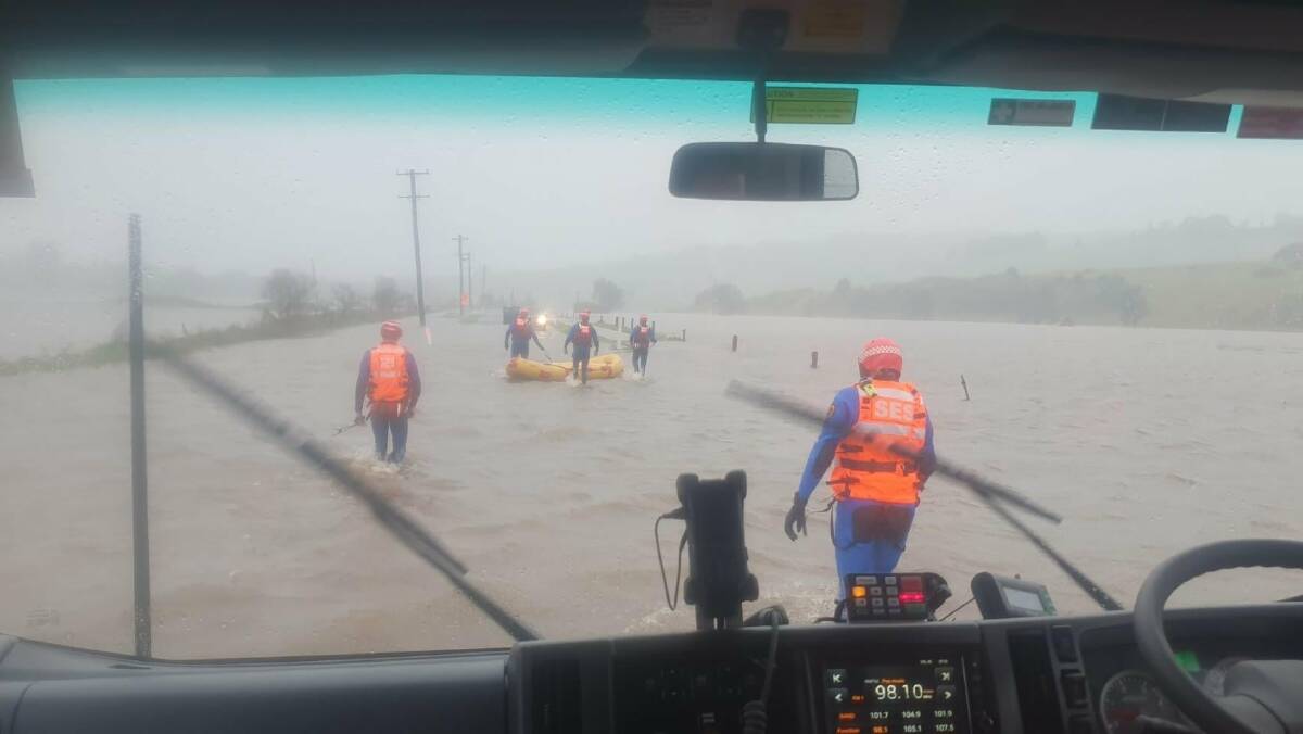 The Kiama SES team helped rescue two drivers stuck in floodwater at Jamberro. Picture: NSW SES
