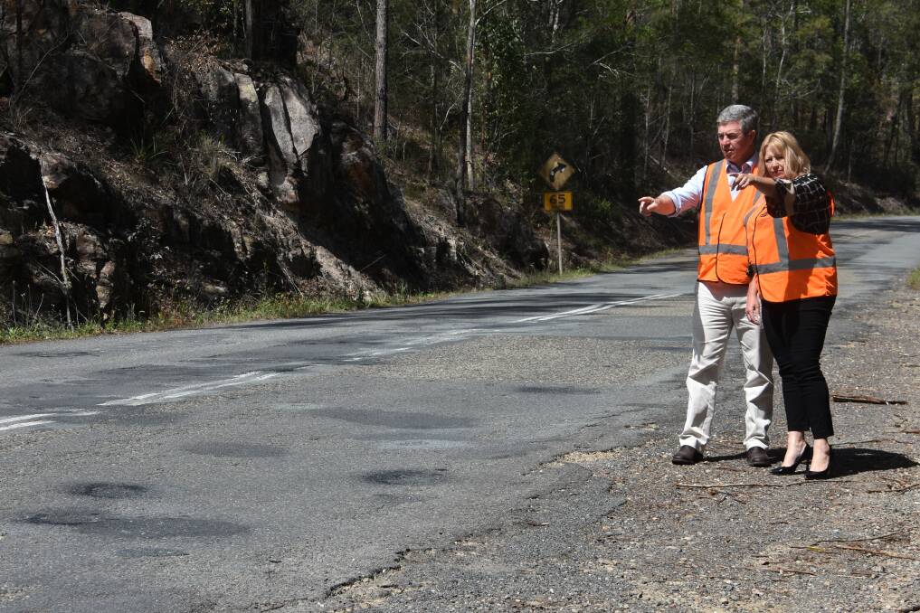 UPGRADE COMING: Port Macquarie-Hastings mayor Peta Pinson and Lyne MP Dr David Gillespie inspect a section of Bago Road which will be getting upgraded. PHOTO: Laura Telford.