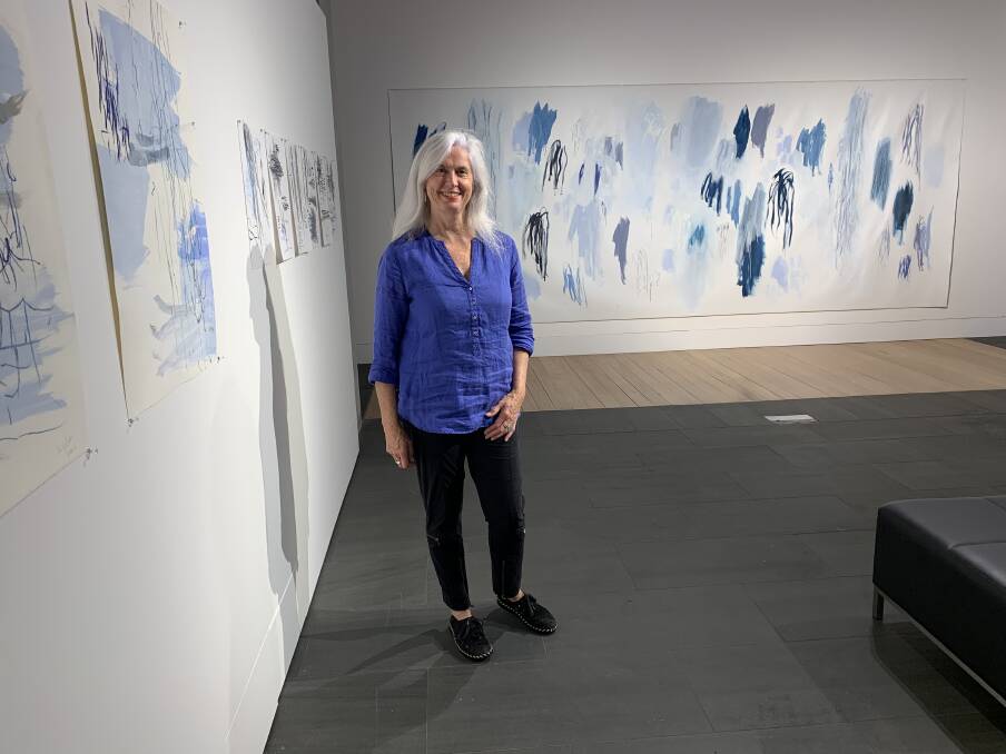 EXHIBITION: Wendy Stokes with her exhibition at the Glasshouse. 
