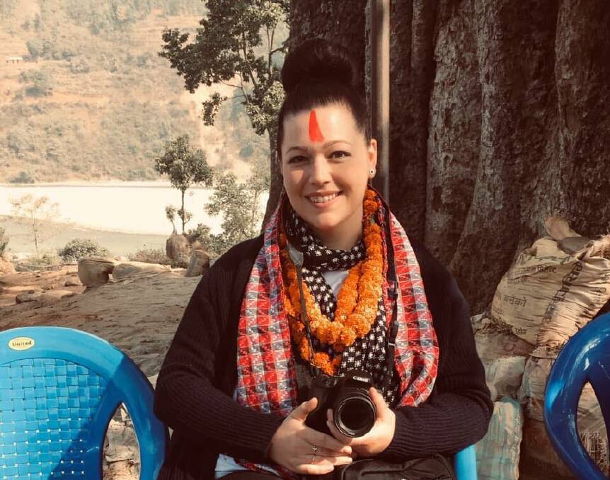EMPOWERMENT: Brittani Michelle at Fisherman's Village in Nepal after taking part in a blessing ceremony.