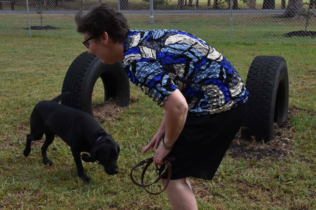 FUN FOR ANIMALS: Kathryn Stephens and her guide dog, Nessy, who is enjoying being off-duty in the Blackbutt Dog Park