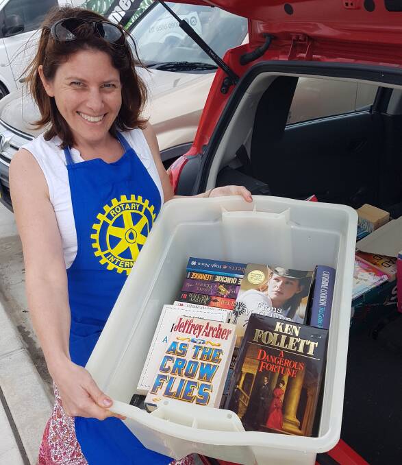 GOOD READ: Wauchope Rotarians have been collecting books ready for the sale at the end of October.