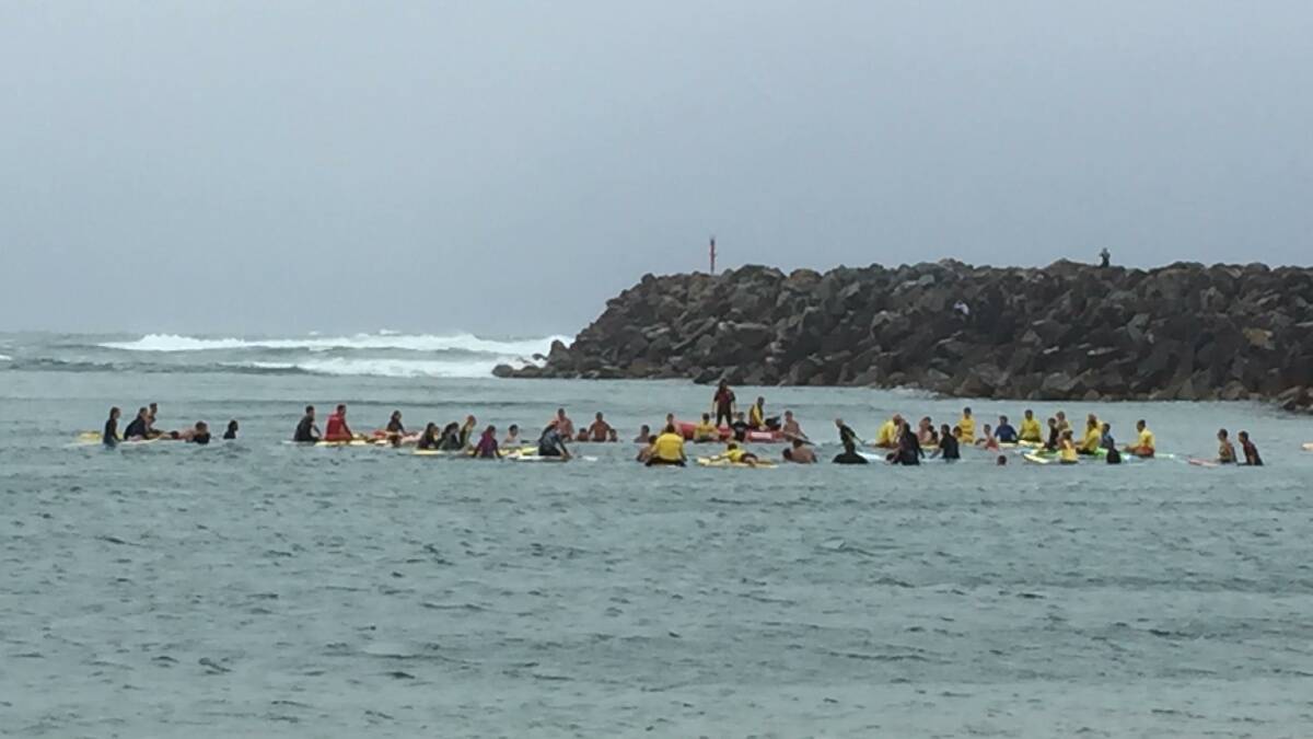 Final farewell: People participated in a paddle out on Thursday, March 22 in a tribute to Carley Taylor and to pay respect to all she had done for the community. 