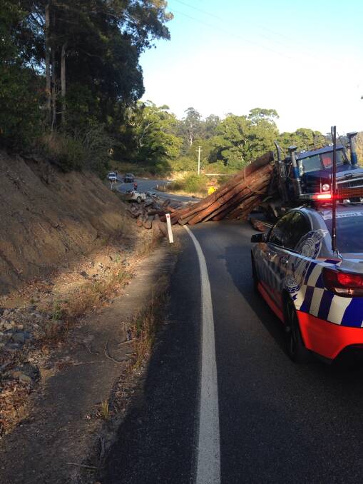 Car driver in hospital after incident involving log truck at Lorne