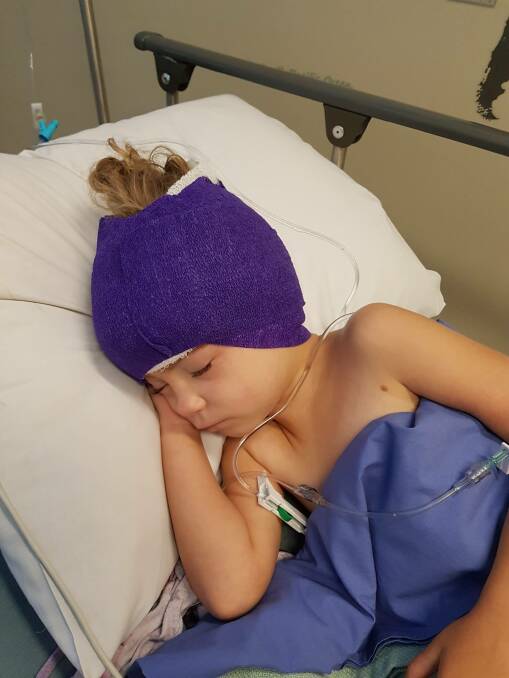 Willow Powick is recovering well after a two hour operation on one of her ears in April. 