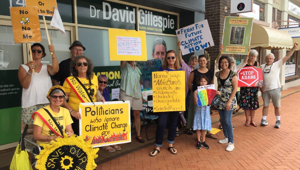The Gloucester Knitting Nannas meet every Friday outside David Gillespie's Taree office to demand he takes more action on climate change.