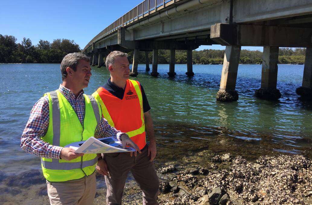 Federal Member for Lyne Dr David Gillespie and council's Group Manager Transport & Stormwater Network Duncan Clarke inspect Dunbogan Bridge scheduled for a $3 million upgrade.