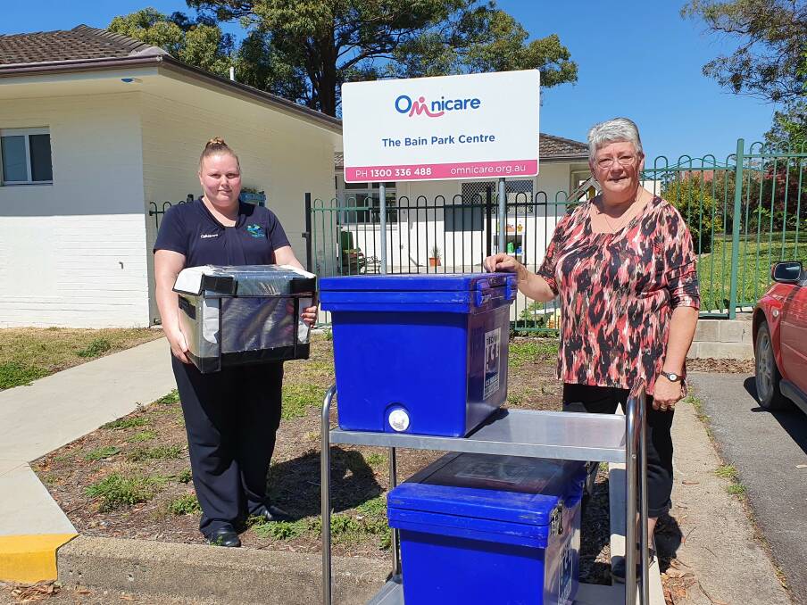 Melissa-Lee Ormrod, Omnicare Meals Service Admin Team Leader; and Kerri Tange, Hastings  Wauchope Branch Service Officer were busy on Thursday moving to the new location
